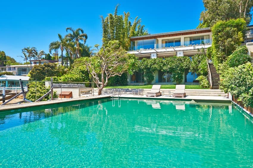 Waterfront property with turquoise pool